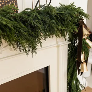Realistic 6ft Norfolk Pine Christmas garland with velvet ribbon and vintage gold bells