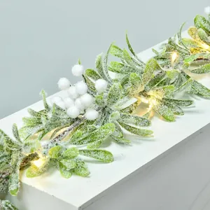 1.8m pre-lit artificial Christmas garland with white flocking and warm LED lights