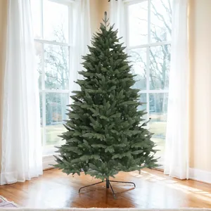 Close-up of artificial PE 5-fork Christmas tree with realistic dense needles and metal stand