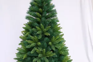 Close-up of dense mixed PVC needles on a green artificial Christmas tree for holiday decor