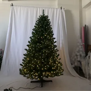 Sapin de Noël artificiel en PE vert avec lumières LED blanc chaud et support noir robuste