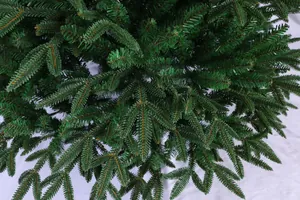 Close-up of dense PE and PVC pine needles showing realistic dark green foliage texture