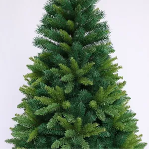Classic green artificial PVC Christmas tree with dense realistic pine needles and cone shape