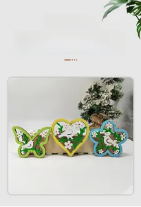 Three-piece laser-cut wooden Easter hanging ornaments with bird and floral hollow patterns