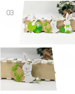 Detail of wooden Easter bunny pendants with polka dots and felt elements for home decor