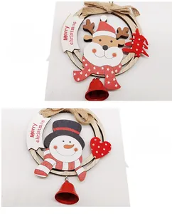 Detail of wooden Christmas rings featuring reindeer and snowman with mini metal bells