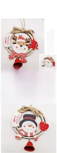 Detail of wooden Christmas ornaments featuring Santa, reindeer, and snowman with metal bells