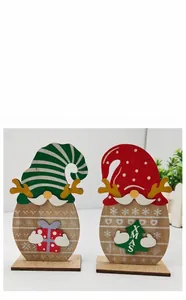 Detailed view of wooden Christmas gnome table ornaments with antlers and XMAS tree