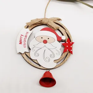 Wooden Christmas ornament featuring painted Santa Claus, red bell and Merry Christmas text