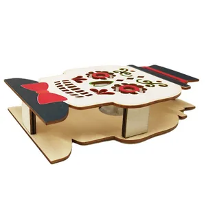 Wooden Halloween skull ornament with colorful Day of the Dead patterns and LED lighting
