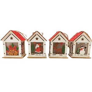 Set of 4 Christmas glowing wooden houses with Santa, reindeer, snowman, and bell motifs