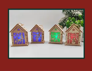 Detail of wooden Christmas house ornaments with laser-cut reindeer silhouettes and LED lights