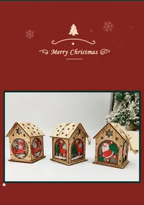 Detailed view of three carved wooden Christmas houses with hanging ropes and reindeer patterns