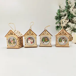 Set of four wooden Christmas house ornaments with colorful Santa and reindeer patterns
