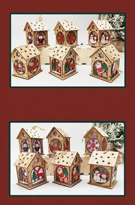 Detail view of 6 wooden Christmas house ornaments with warm LED light and snowflake cutouts