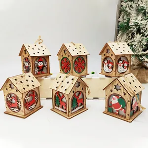 Set of 6 lighted wooden Christmas house ornaments with holiday characters and twine