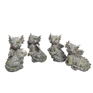 Set of four cute resin dinosaur garden statues with detailed scales and playful poses