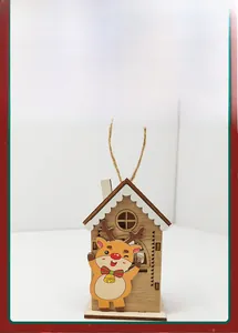 Detailed view of hollow wooden Christmas house ornament with a cute reindeer and jute rope
