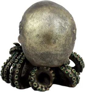 Macro detail of octopus tentacles with green patina suckers on a metallic skull sculpture