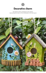 Detailed view of hand-painted resin birdhouse ornaments with floral and insect motifs