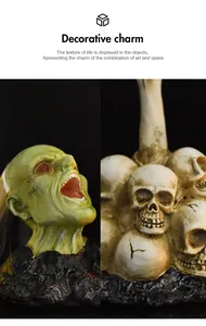 Detail of gothic zombie head and miniature skulls with eerie green finish and red eyes