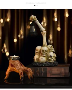 Macro shot of Halloween skeleton hand resin lantern with realistic bone details and lighting
