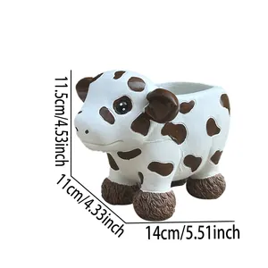 Detailed size chart of the cow resin planter showing height 11.5cm and length 14cm