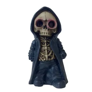 Halloween cartoon grim reaper skull figurine with black hooded robe and ribcage detail