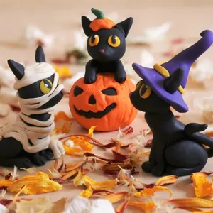 Three-piece Halloween cat figurines set including mummy, pumpkin, and witch cat
