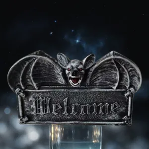 Gothic resin bat plaque with red eyes and relief Welcome text on a starry background