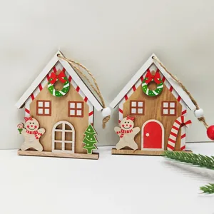 Set of two gingerbread house wooden ornaments with festive patterns for Christmas trees
