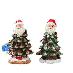 Resin Christmas tree ornaments with Santa Claus head and festive gold and white snow details