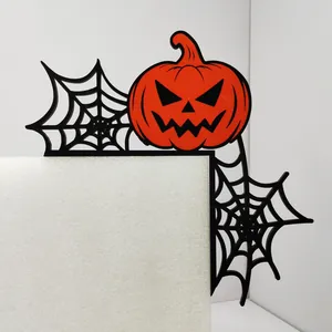 Halloween door corner decor featuring laser-cut spider web and orange pumpkin detail