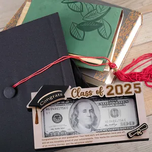 Close-up of wooden graduation money holder with Class of 2025 text and black cap tassel