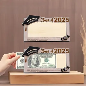 Detail of wooden Class of 2025 graduation money clip holder with 3D cap and congrats text