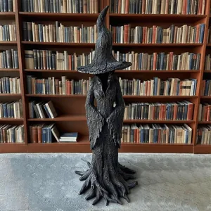 Hand-painted enchanting witch statue with tree bark texture for Halloween magic decor