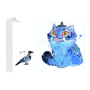 Advent calendar box featuring artistic blue tiger illustrations and numbered date slots