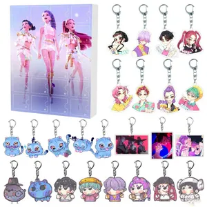 Detailed set of acrylic KPOP character keychains with a Christmas advent calendar box