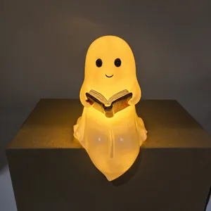 Cute ghost reading book night light with warm yellow glow for Halloween decoration
