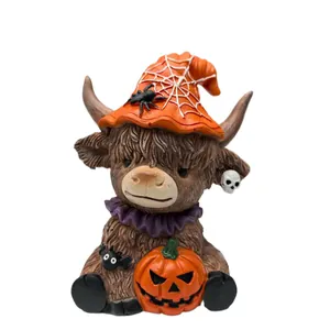 Halloween highland cow figurine with orange wizard hat and pumpkin for home decor