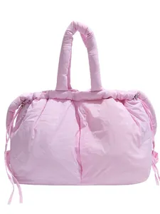 Pink quilted cotton tote bag featuring a puffer cloud design and drawstring closure