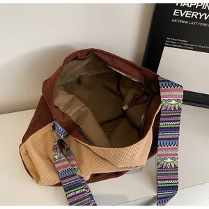 Detailed view of corduroy tote bag with ethnic wide strap and inner zipper pocket