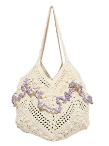 Handwoven cream cotton tote bag with purple wavy trim and large capacity for beach travel