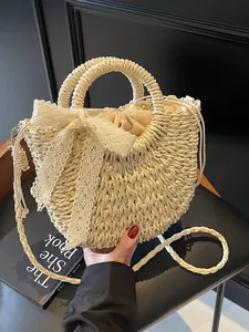 Sac à Main en Paille d'Été Femmes Nœud en Dentelle Sac Bandoulière Plage Sac Seau en Papier Tissé Avec Cordon de Serrage Vacances
