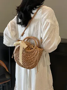 Sac à main de plage en paille avec nœud en dentelle et bandoulière pour les vacances