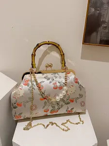 Elegante tas in Chinese stijl met bamboe handvat en schattig kattenpatroon
