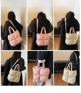 Quilted puffer tote bags in pink and cream shown on model in various carrying styles