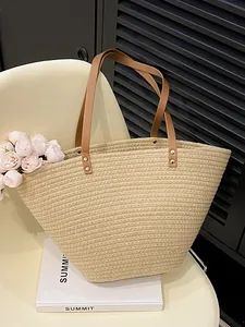 Large capacity woven straw tote bag with brown leather handles for summer beach vacations