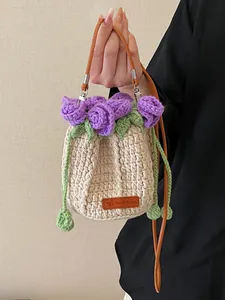 Handmade crochet rose bucket bag in cream white cotton with brown leather straps