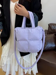 Quilted down-style lavender tote bag with cross-body strap and soft nylon texture
